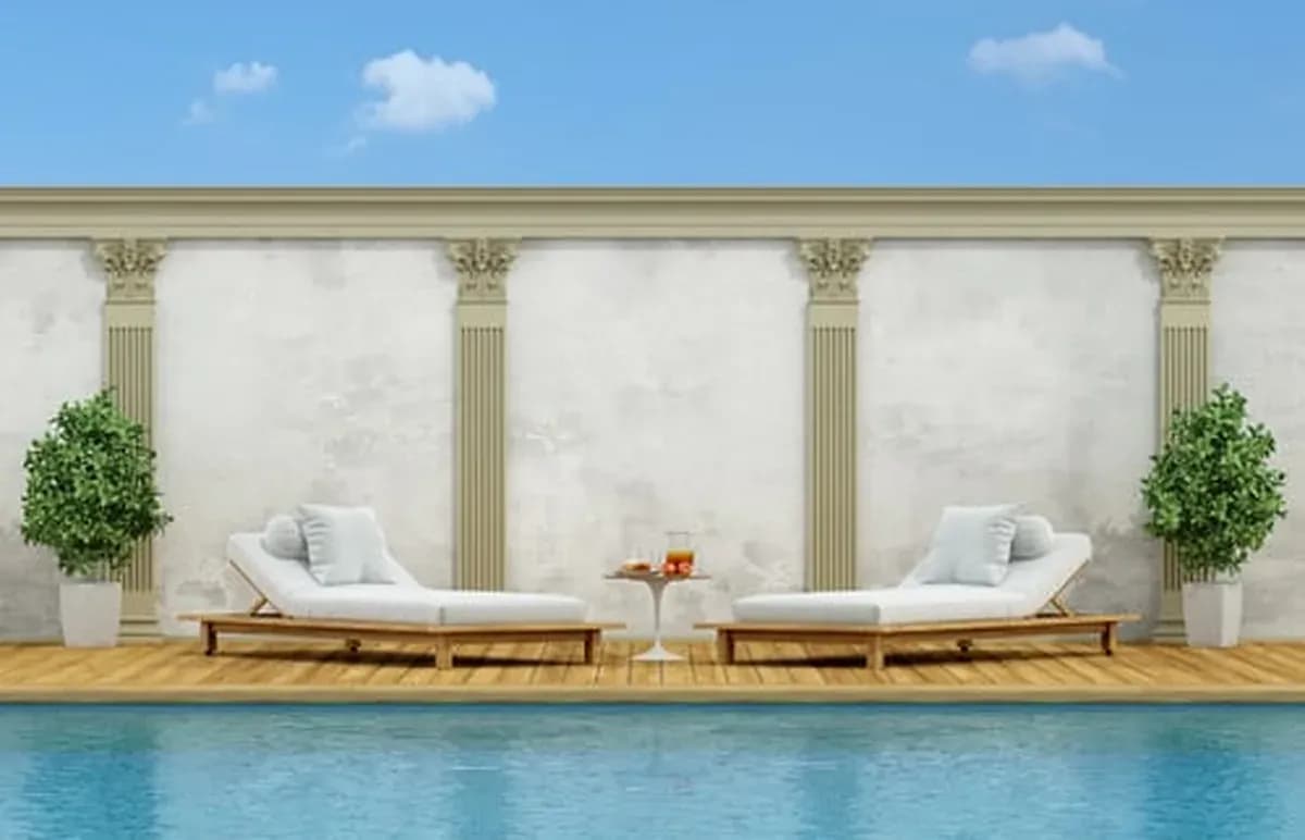 Luxury backyard swimming pool with lounge seating